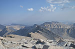 Looking south from the summit plateau. The jagged ridge is the back side of the sharp needles visible to the left of Whitney from the east.  