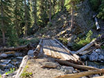 Partially washed out bridge over Marten Creek